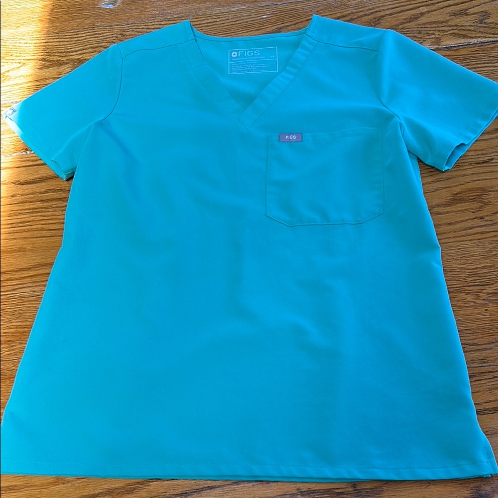 Figs Catrina style scrub shirt.  Aqua/mint color.  Size XS.